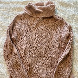 Pink turtleneck sweater